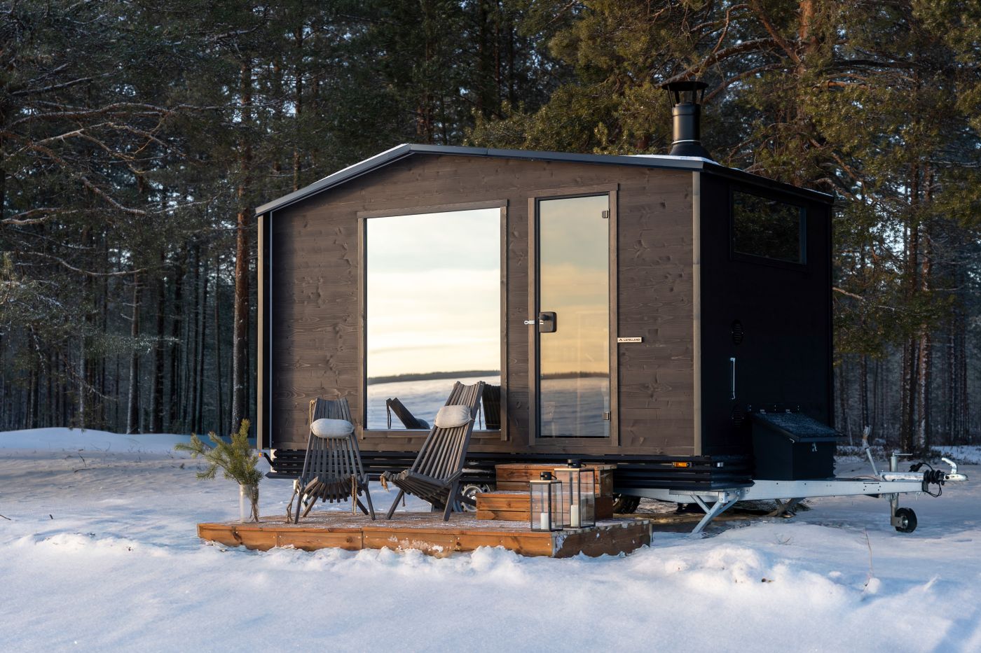 Authentic finnish sauna relax in winter now lakeside on Lake Geneva in Anieres for hot sauna-cold plunge wellbeing