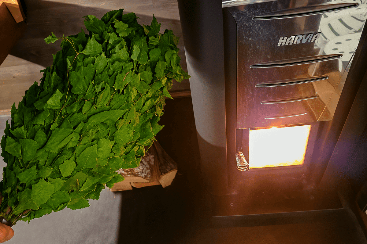 Hot Harvia wood-burning stove provides a fabulous authentic sauna experience with vihta (birch whisk) being ready to use for a traditional sauna wellness experience.